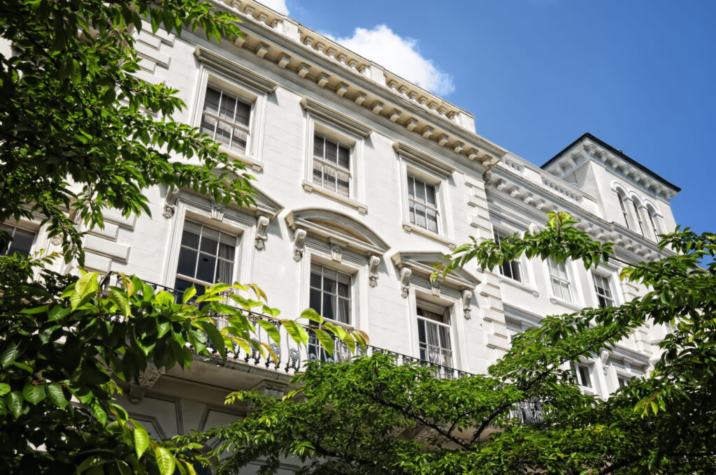 Impressive exterior of stucco fronted houses in Prime Central London