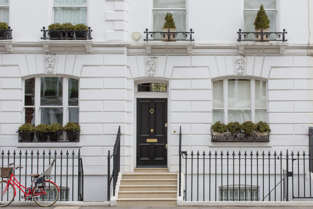 White stucco fronted house in Prime Central London's South Kensington